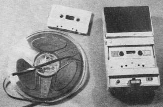 Cassette is compared with an ordinary 7-inch open reel of tape - RF Cafe