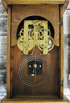 Close-up of pendulum-driven escapement mechanism-  RF Cafe