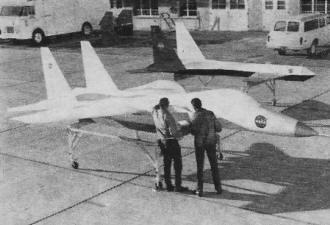 Engineers check out F-15 model - RF Cafe