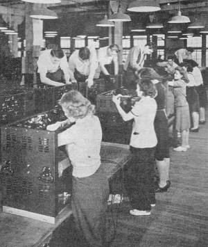Transmitters being assembled on one of the many assembly lines - RF Cafe