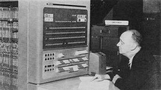 Dr. Paul Herget at the console of the IBM 704 Electronic Data Processing Machine - RF Cafe