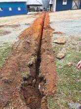 Trench between warehouse and barn - RF Cafe