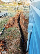 2" PVC conduit between utility pole and warehouse - RF Cafe