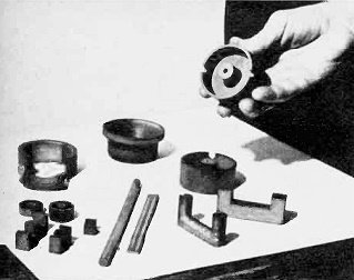 Sample ferrite stampings include TV yokes - RF Cafe