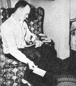 Another K9 and his canine sort the mail and QSL cards with the aid of a circular file - RF Cafe