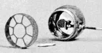 Visible in close-up of cavity are tuning post in center and the antenna plate - RF Cafe