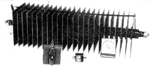 This photo shows a large 5-amp. selenium rectifier compared in size with a 500-ma. unit - RF Cafe