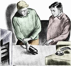 Carl showing spinning motor inertial to Jerry - RF cafe