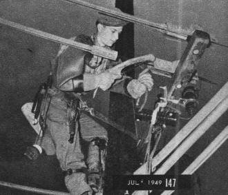 To cut high-tension wires, linemen use special wood-handled hack saw - RF Cafe