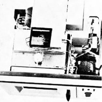 Cover off MC-24 microwave oven reveals the oven cavity - RF Cafe